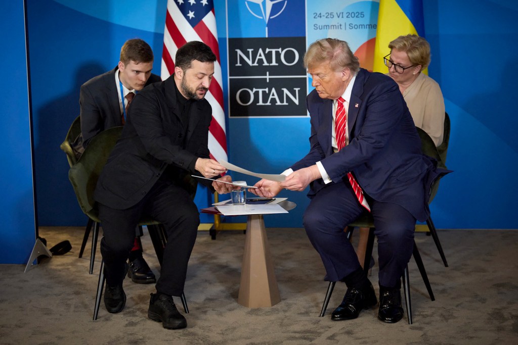Ukrainian President Volodymyr Zelensky and President Donald Trump meet during the NATO summit in The Hague on June 25, 2025.