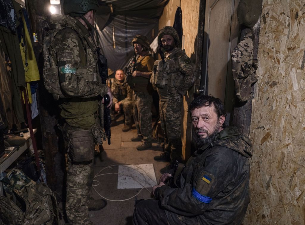 Soldiers from Ukraine's 93rd Separate Mechanized Brigade take shelter near the frontlines of the Donetsk region on Aug. 4, 2025.