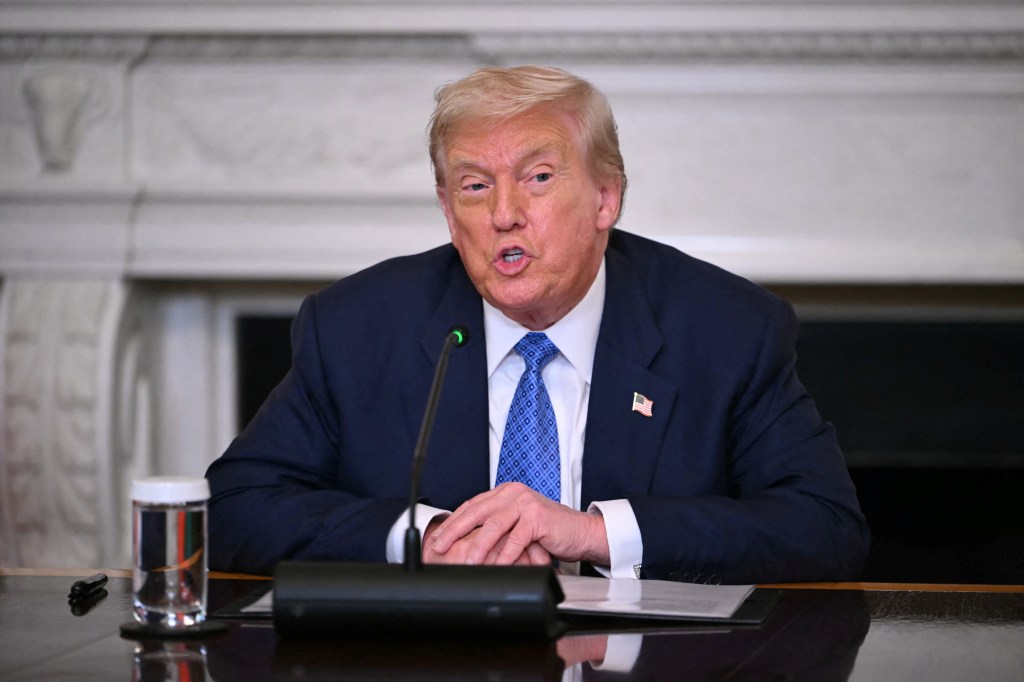 President Donald Trump speaks to reporters during a signing ceremony in the White House on Aug. 8, 2025.