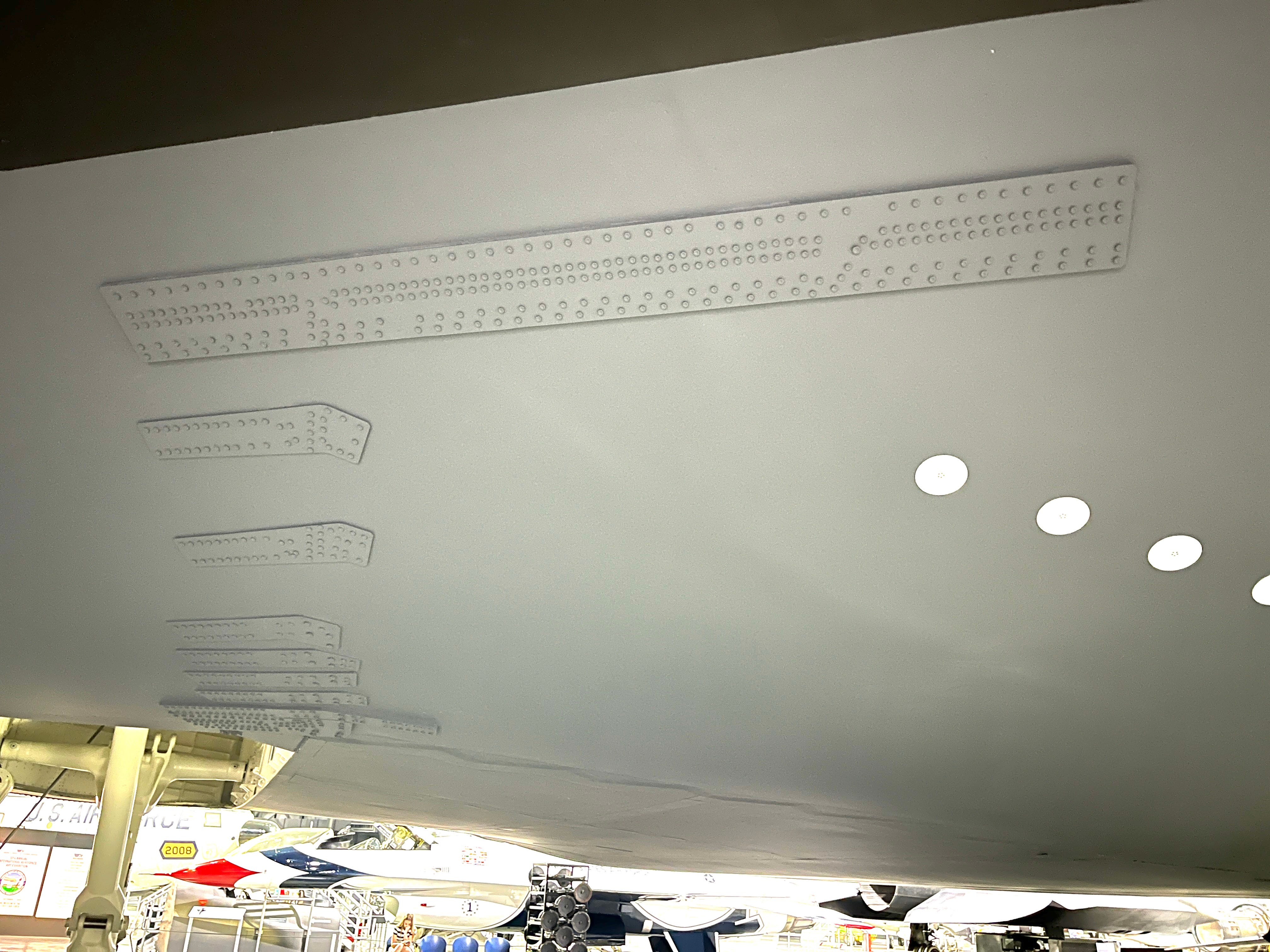 Patches under the wing of a B-2 at the National Museum of the US Air Force.