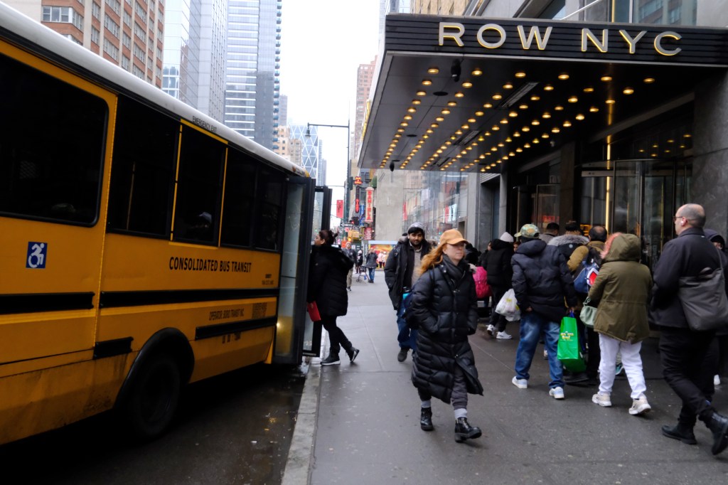 School bus dropping off children at the Row NYC hotel.