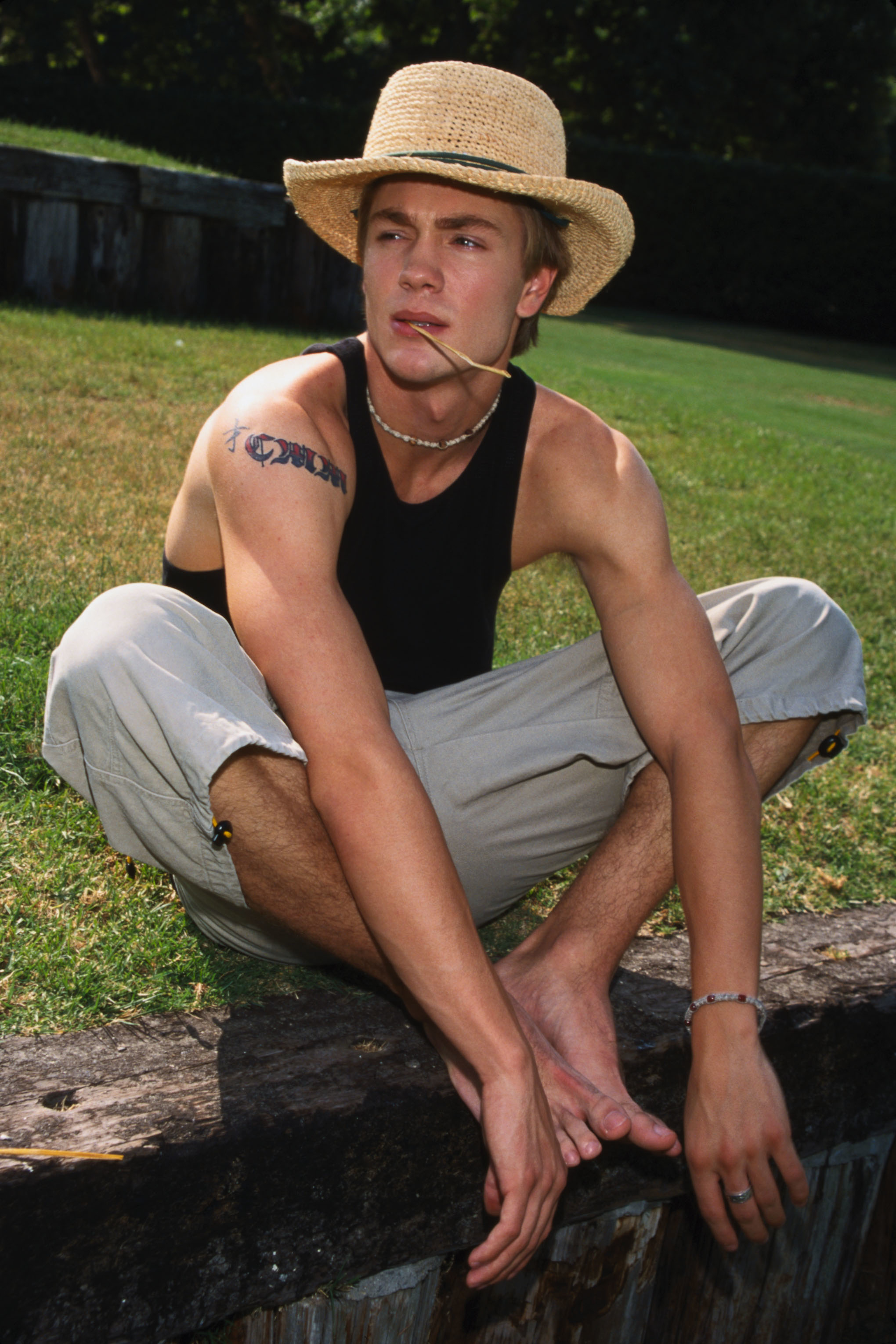 Chad Michael Murray on the grass. 