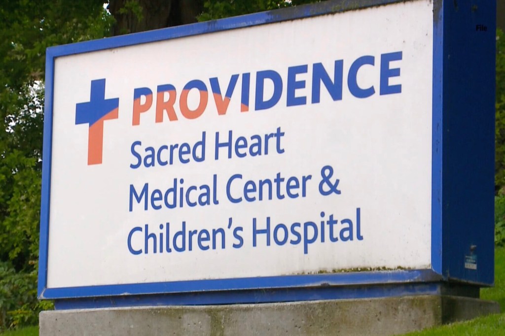 Providence Sacred Heart Medical Center & Children's Hospital sign.
