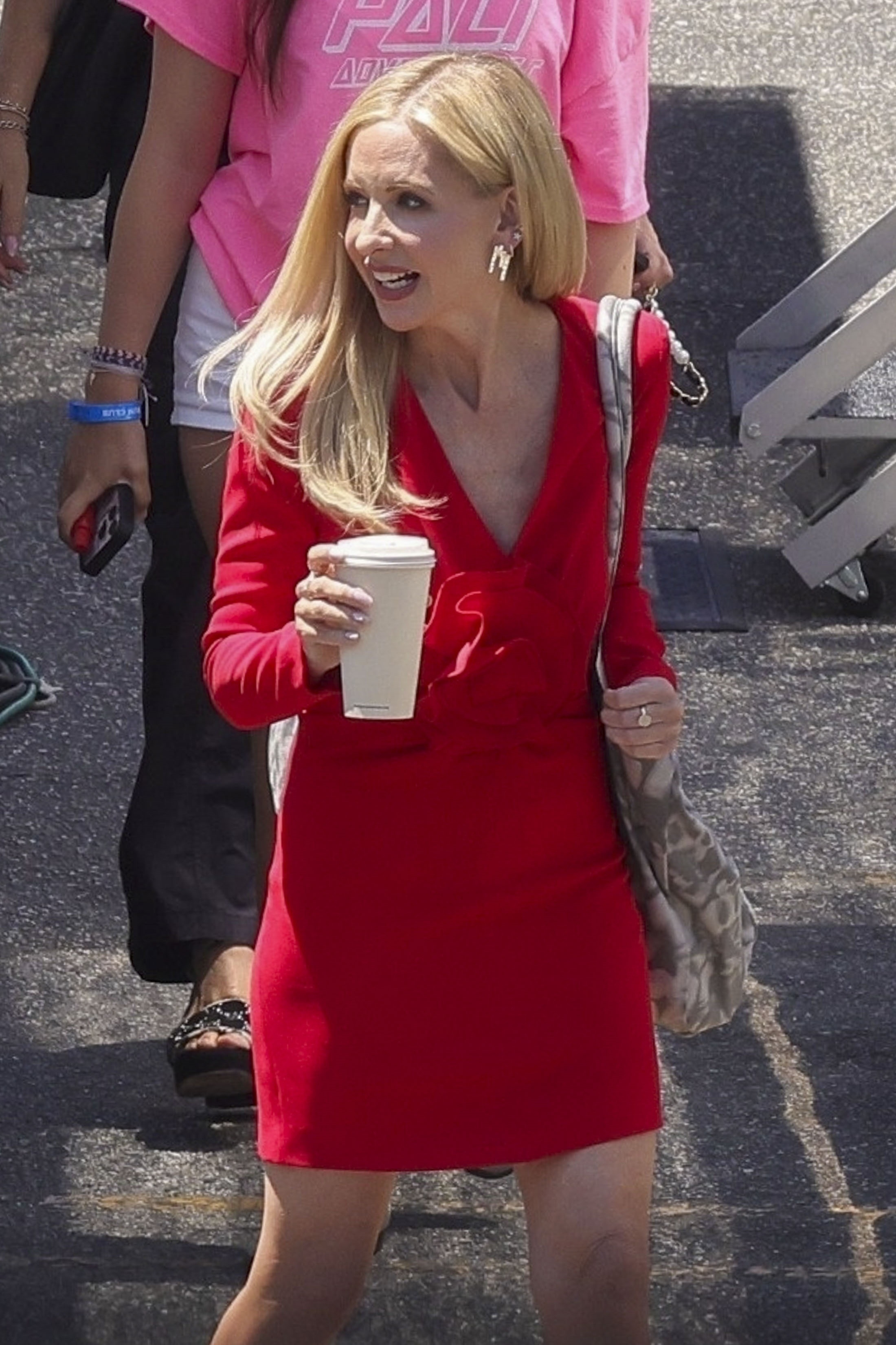 Sarah Michelle Gellar with a coffee cup. 