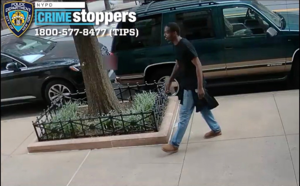 CrimeStoppers image shows suspect wanted for punching elderly man outside of NYC Apple store on Aug. 5, 2025 as he walks down the street