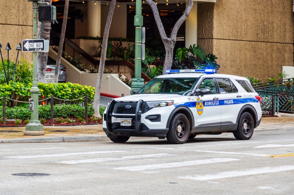 Honolulu Police vehicle on Kuhio Avenue.