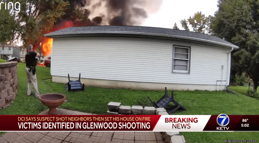 Police officers report to a shooting call to discover the Iowa home on fire on Aug. 6, 2025.