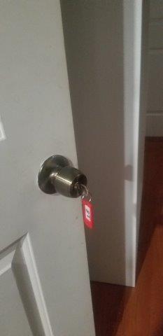 Door with key in lock.