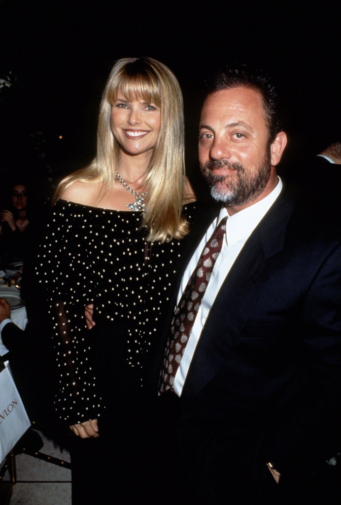 Christie Brinkley and Billy Joel smiling together in 1993.