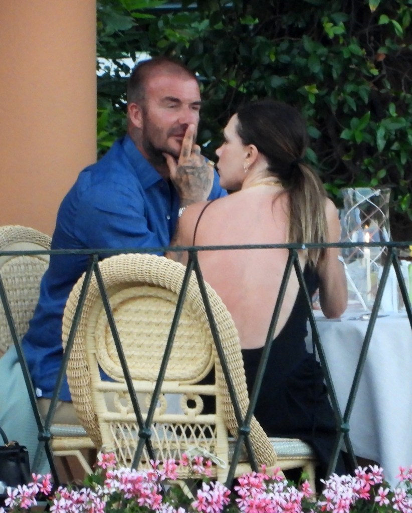 David and Victoria Beckham having dinner in Italy.