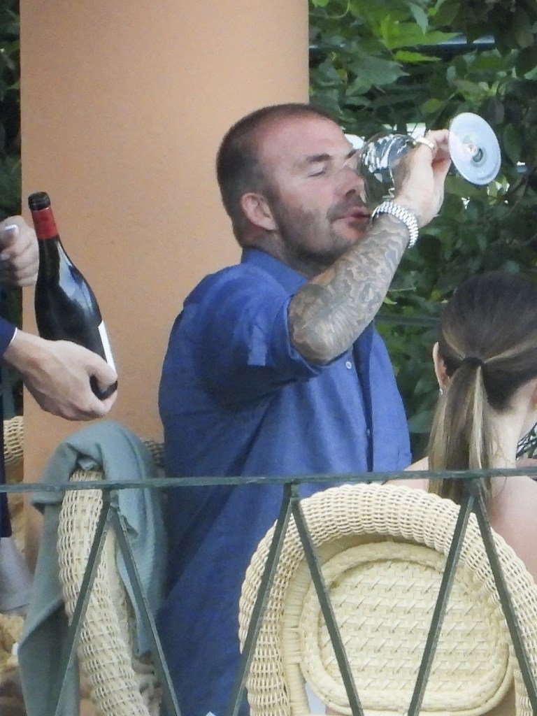 David Beckham drinking wine in Italy.
