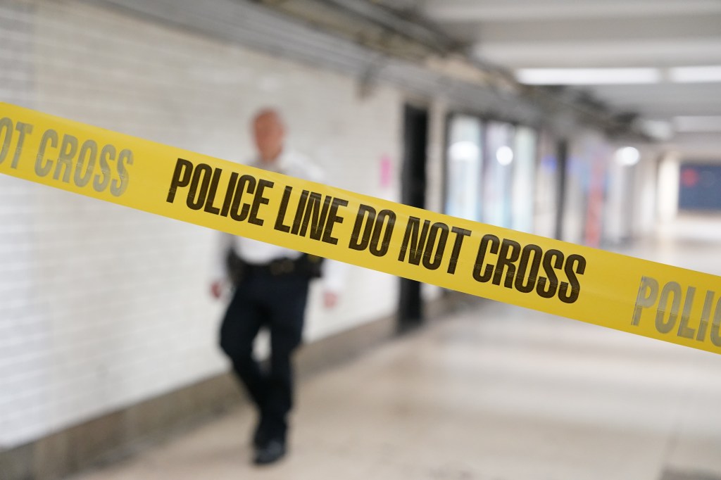 Police tape at a crime scene in Penn Station.