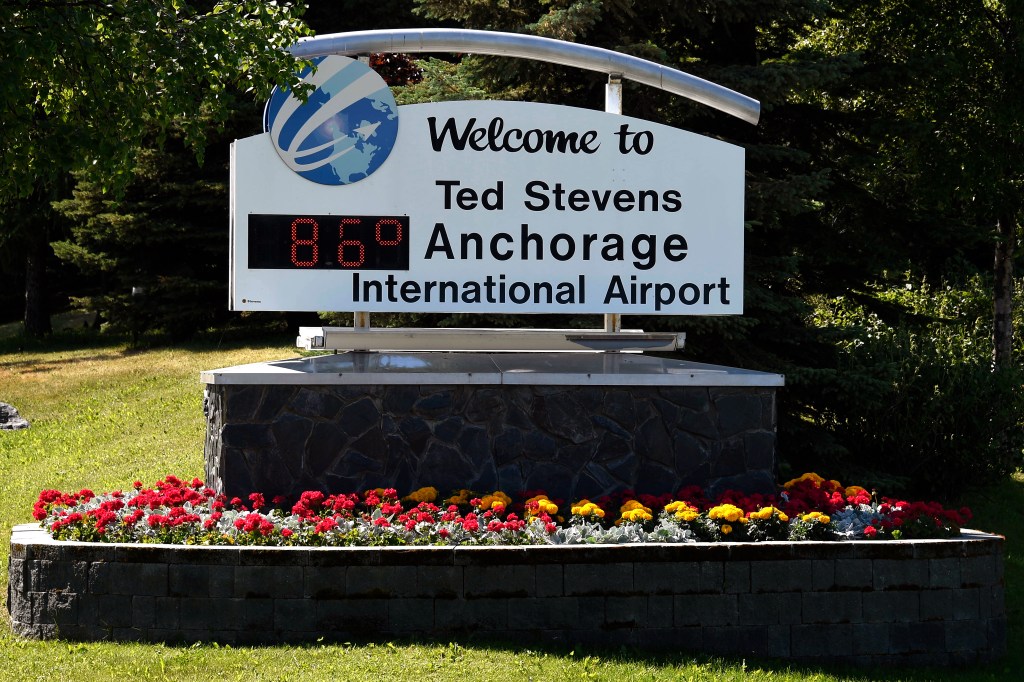 Ted Stevens Anchorage International Airport sign with temperature display.