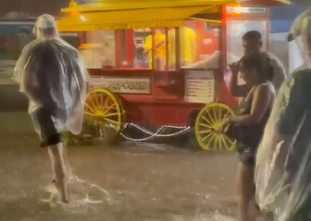 flooded roads and homes and forcing officials to close the Wisconsin State Fair.