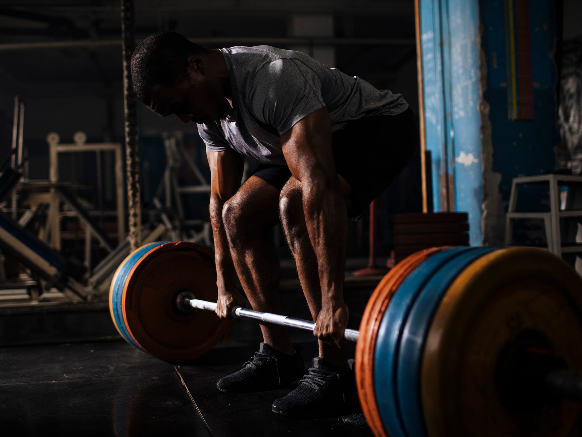 A man deadlifting