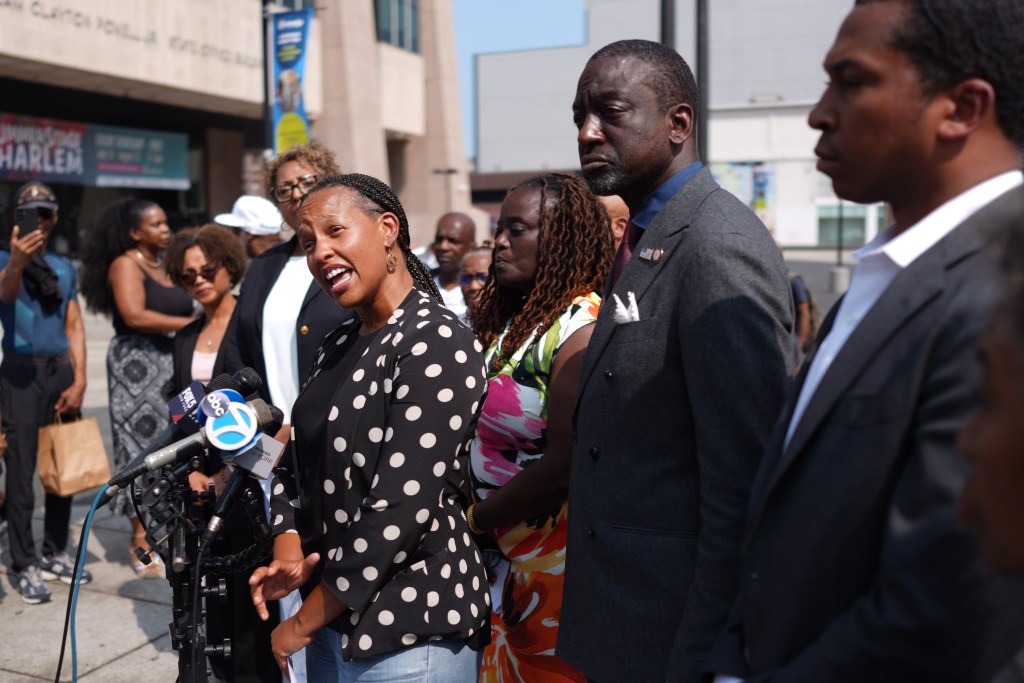 Dr. Michelle Morse, Acting Health Commissioner and Chief Medical Officer of the NYC Department of Health and Mental Hygiene, speaking at a press conference on the Legionnaires' disease outbreak in Harlem along with Councilmember Yusef Salaam (left) and Assemblyman Jordan Wright (right) on Aug. 7, 2025.