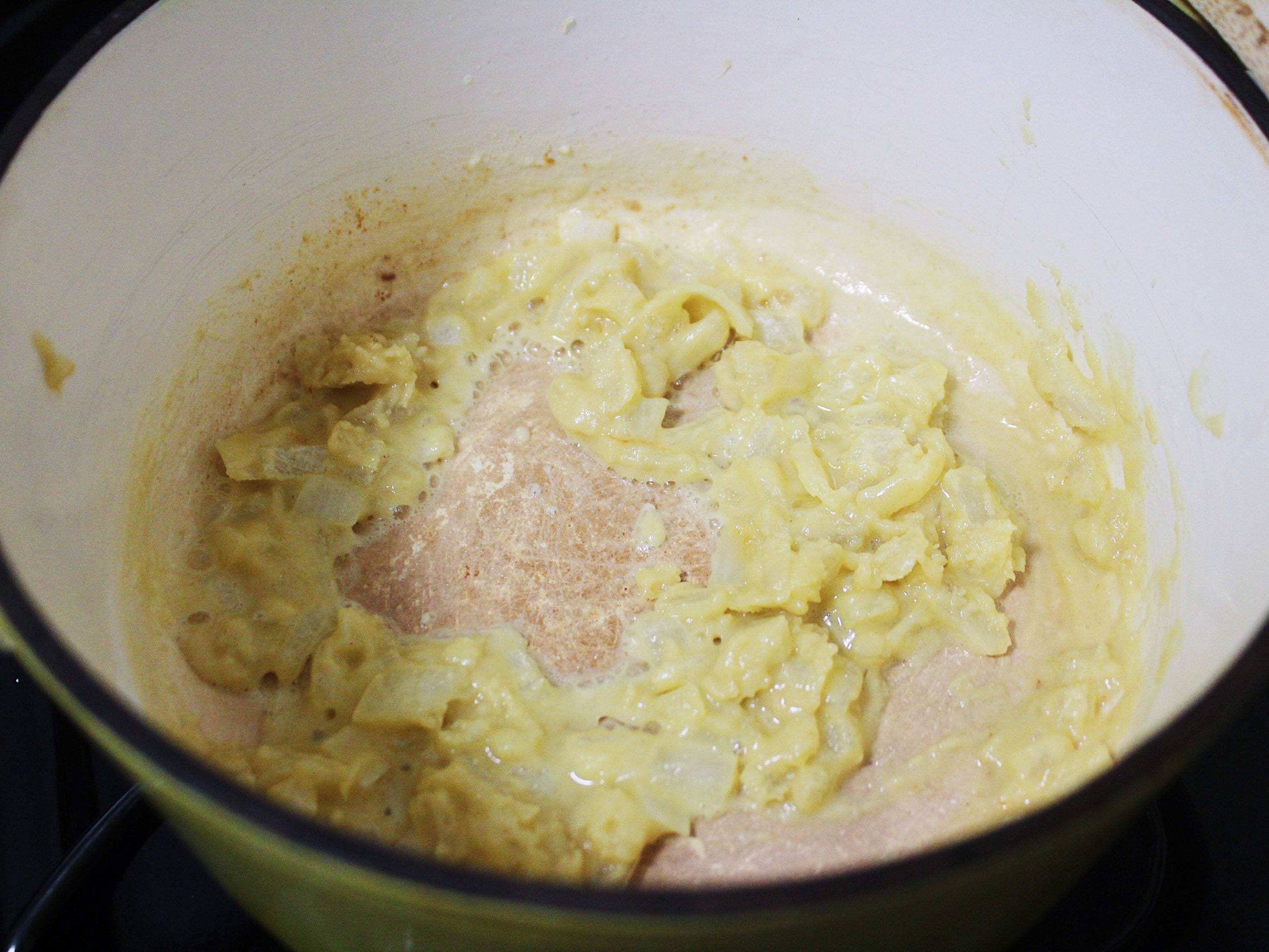 onions and butter mixed with flour on the stove