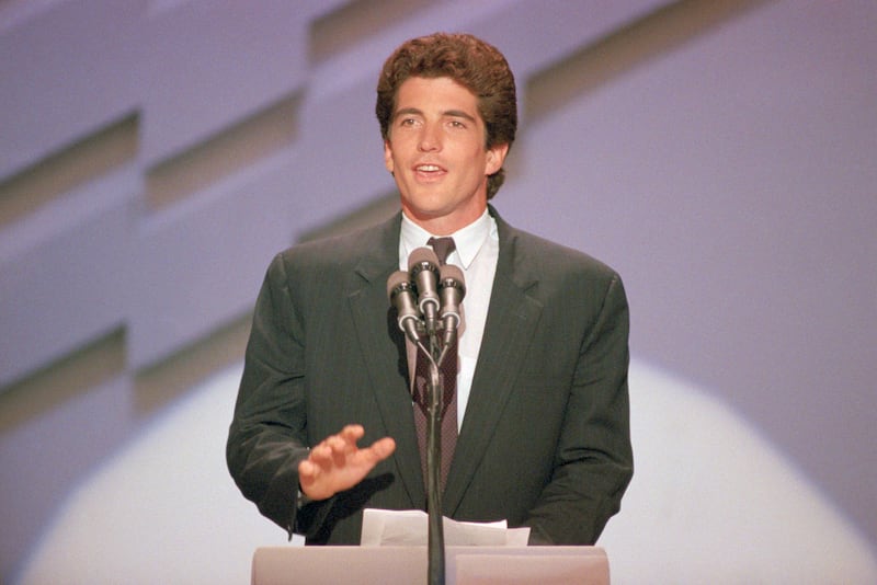 John F. Kennedy Jr., snaps off a quick salute to the delegates at the Democratic National Convention.