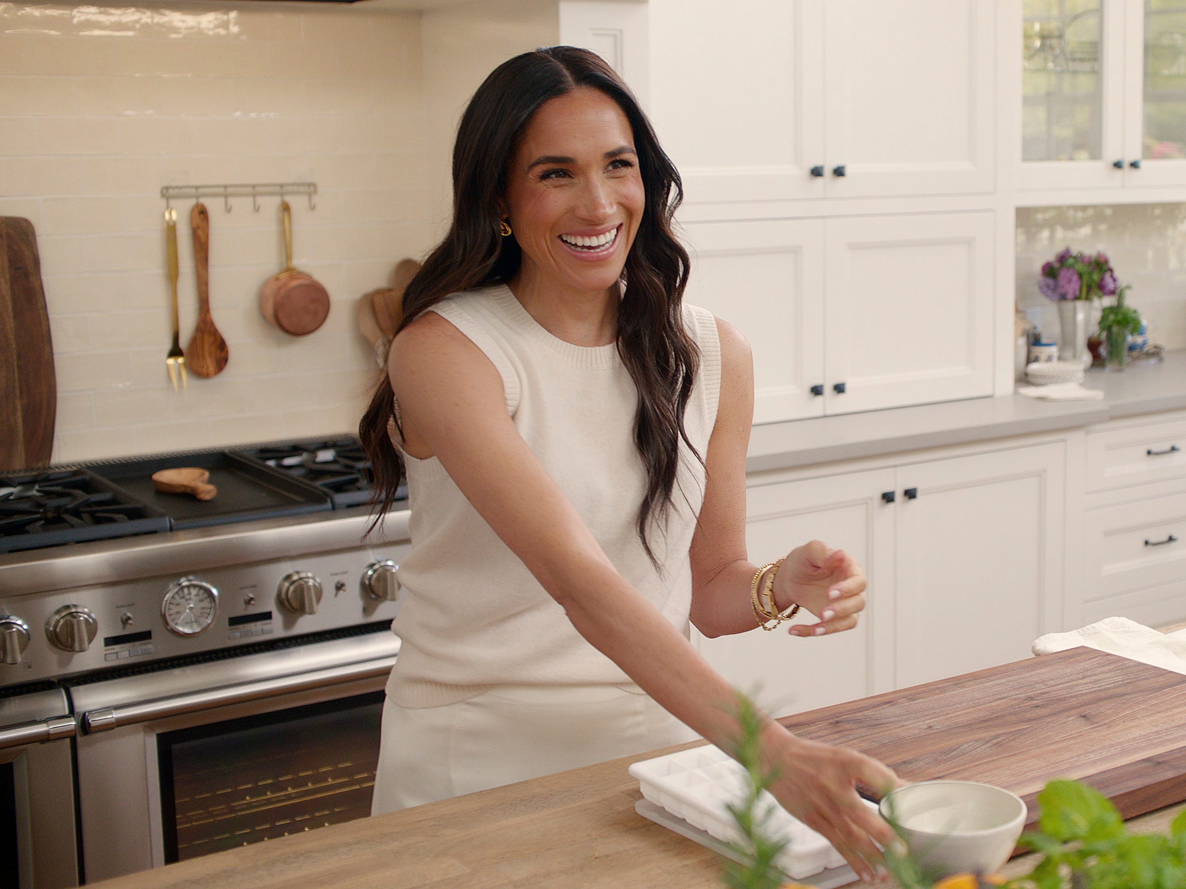 A photo of Meghan Markle in a kitchen.