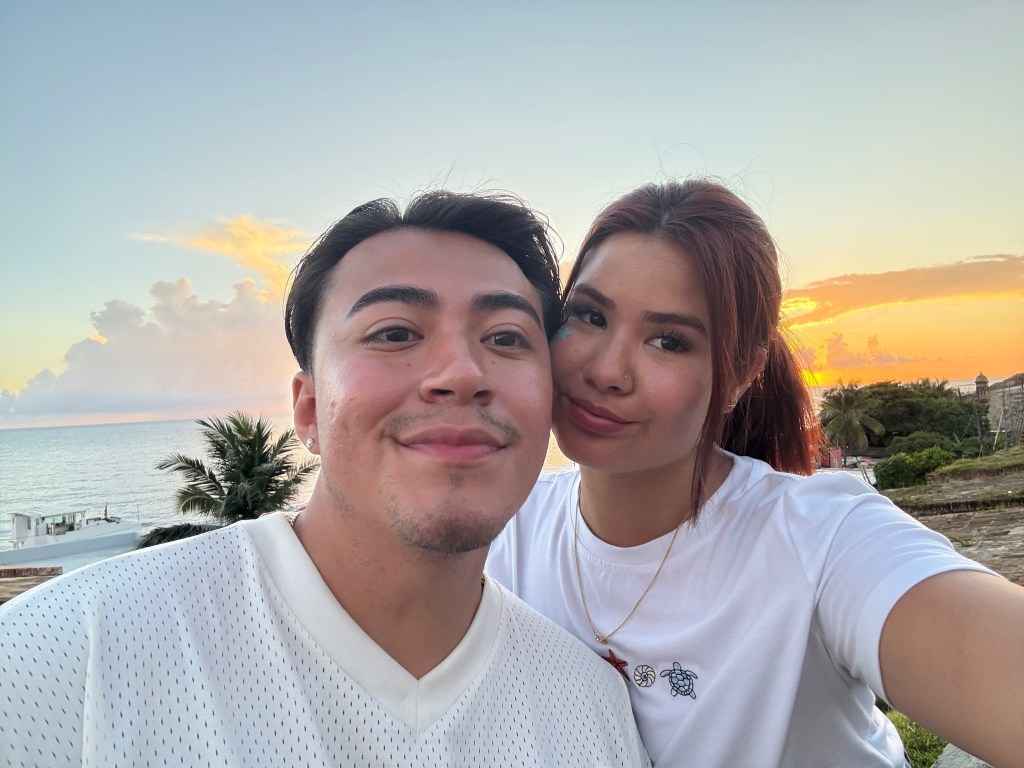 Selfie of Kevin Mares and his girlfriend Angy Arguello at sunset.