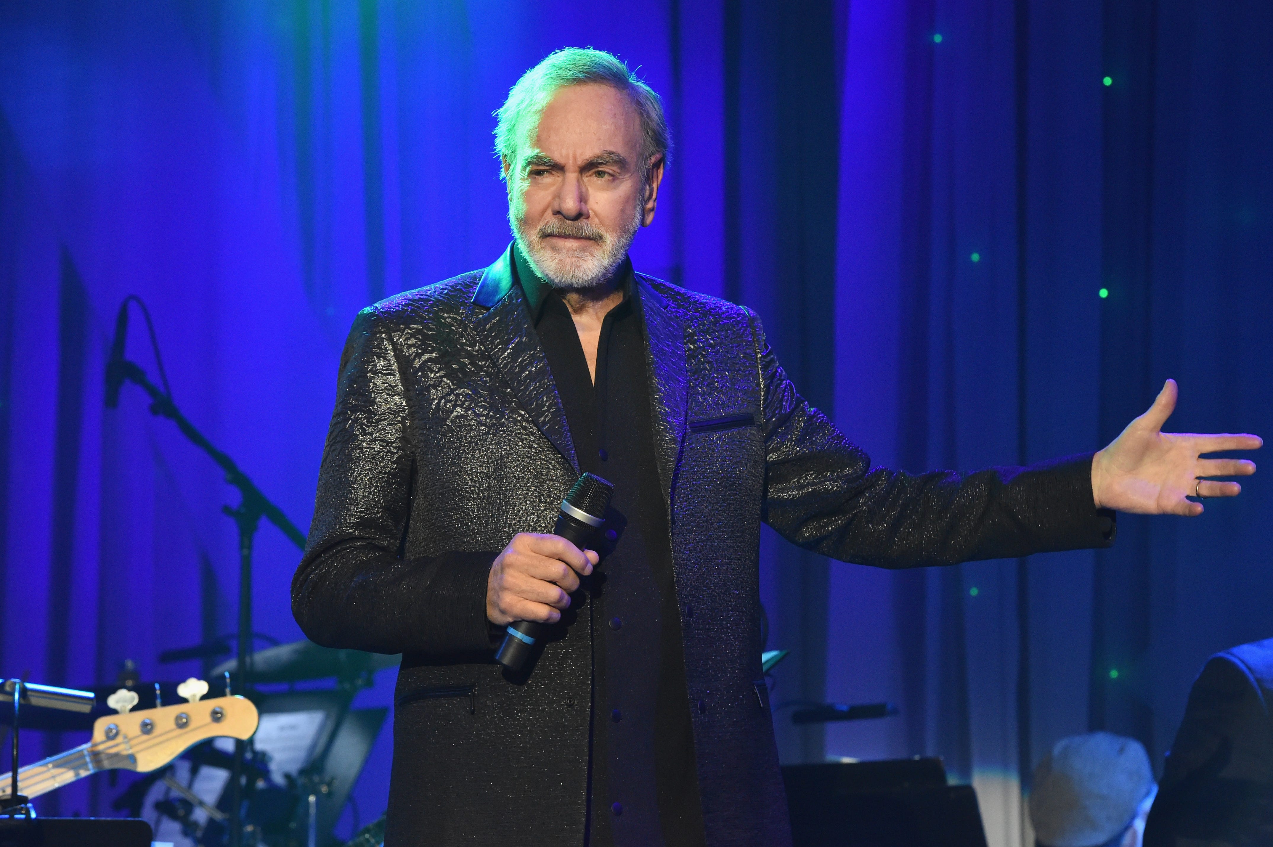 Singer Neil Diamond performs onstage at Pre-GRAMMY Gala and Salute to Industry Icons Honoring Debra Lee at The Beverly Hilton on February 11, 2017
