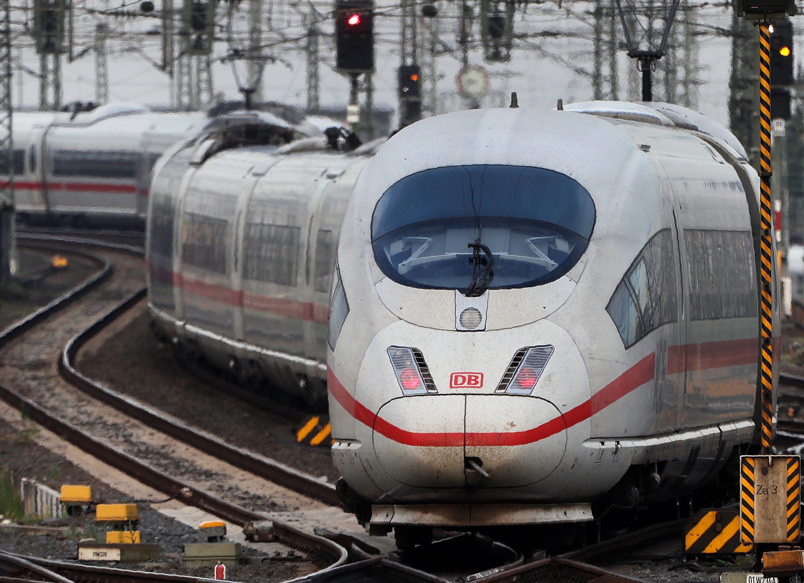 FILE - In this Wednesday, June 19, 2019 file photo, an ICE train approaches the main train station in Frankfurt, Germany. Germany's upper house of parliament has approved a plan to lower the value-added tax on train tickets, making rail travel cheaper from Jan. 1, 2020. (AP Photo/Michael Probst, file)