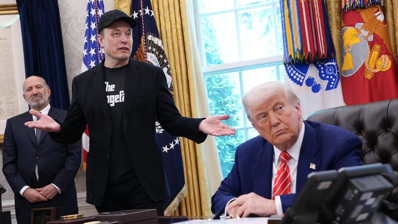 Tesla CEO Elon Musk speaks alongside U.S. President Donald Trump to reporters in the Oval Office of the White House on May 30, 2025 in Washington, DC. Musk, who served as an adviser to Trump and led the Department of Government Efficiency, announced he would leave his role in the Trump administration to refocus on his businesses.