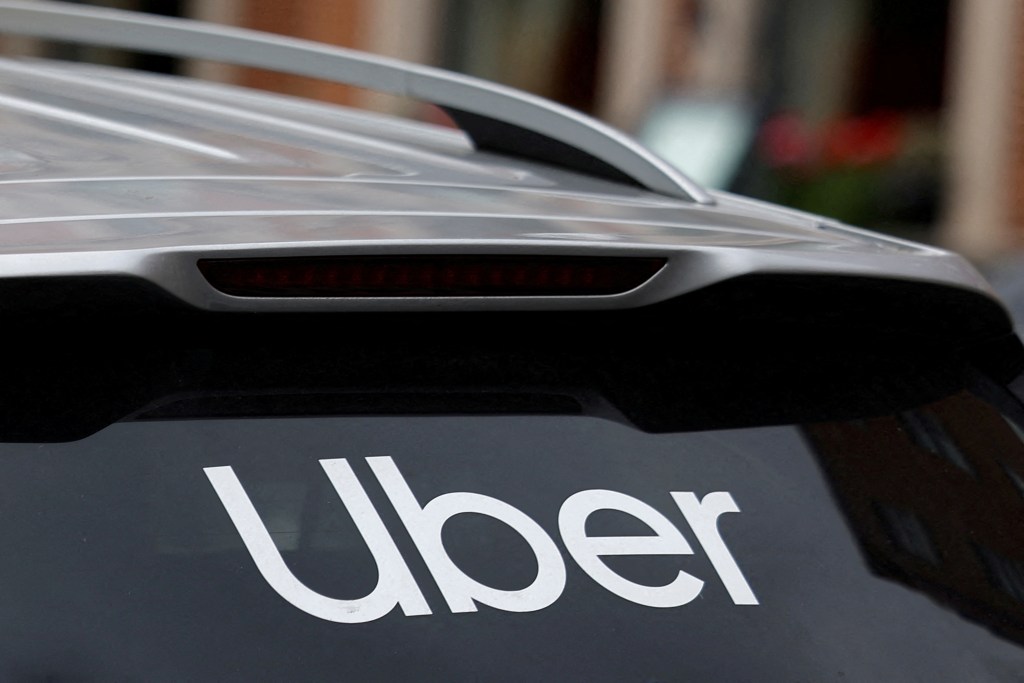 Uber logo on a taxi.