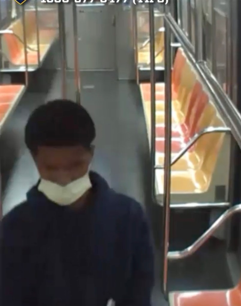 Surveillance image of a suspect in a subway car.