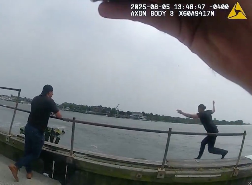 A determined NYPD cop removed her gear from her belt and jumped into the water after Swafford.