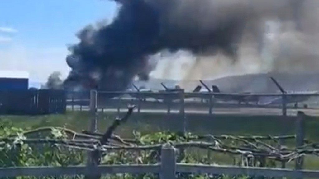 Burning plane wreckage at Kalispell City Airport.