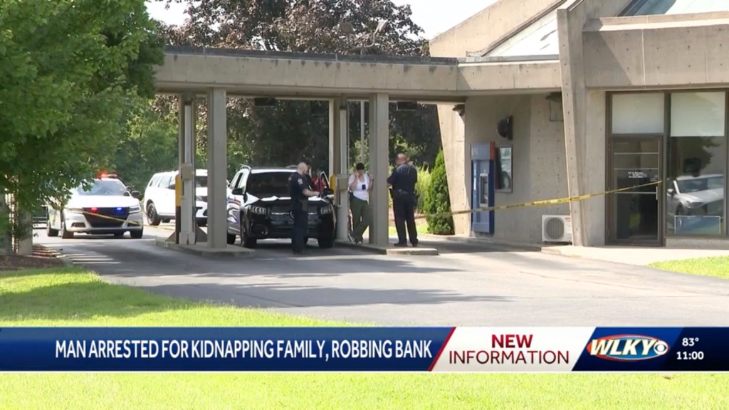 Police at bank robbery scene.
