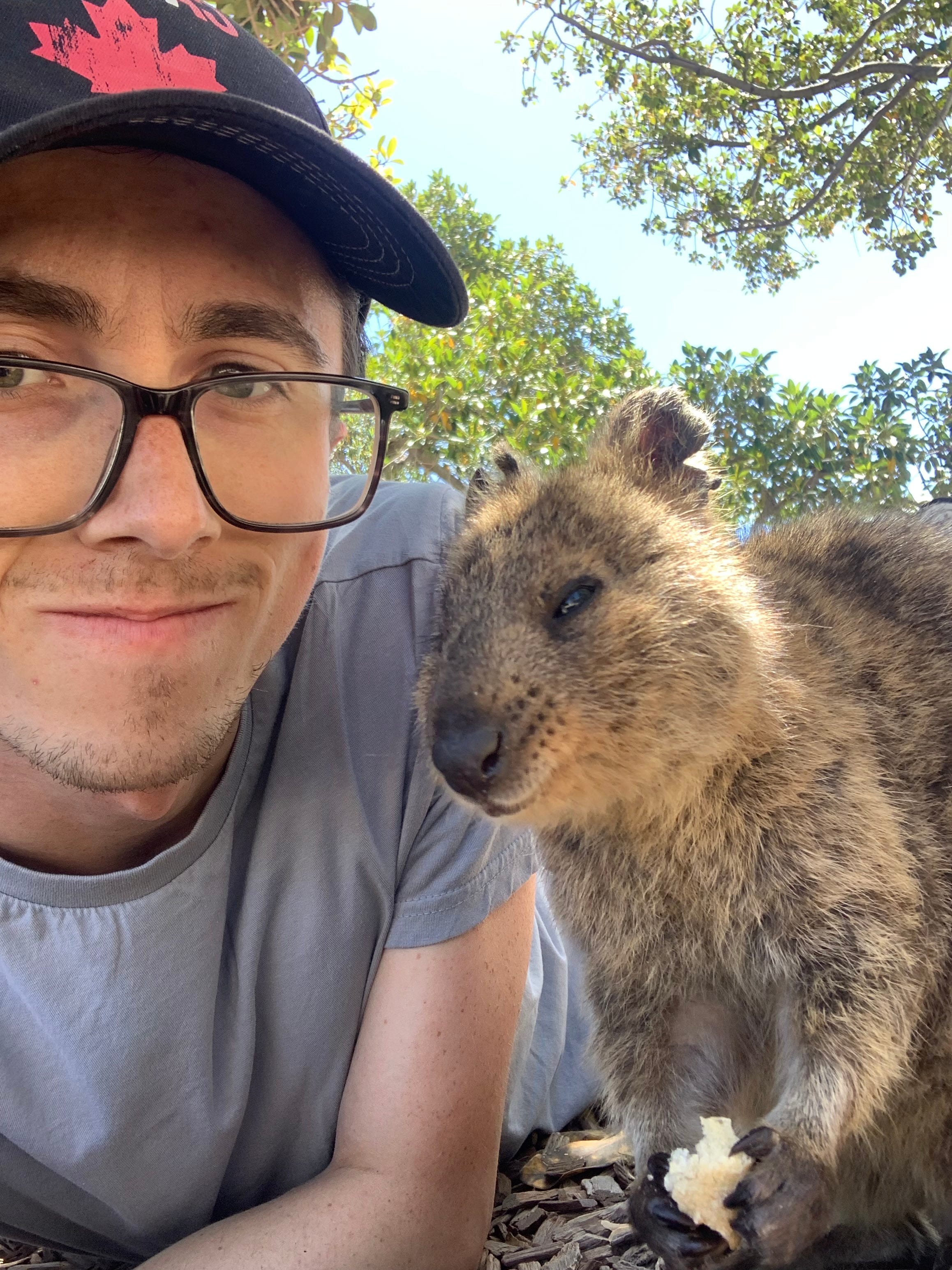 Matt Lillywhite posing with a quokka in Australia