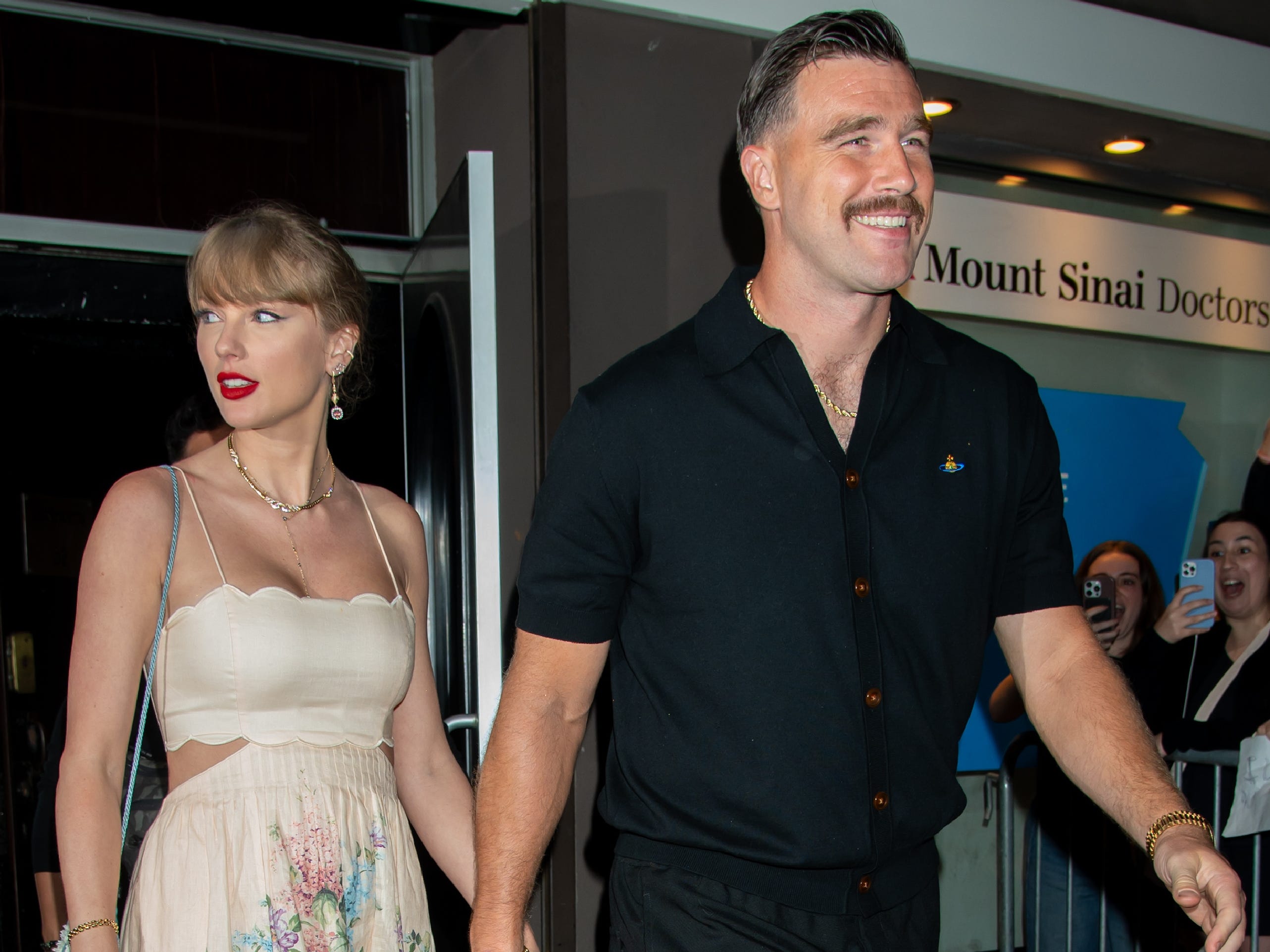Taylor Swift and Travis Kelce leave a friend's wedding in New York City.