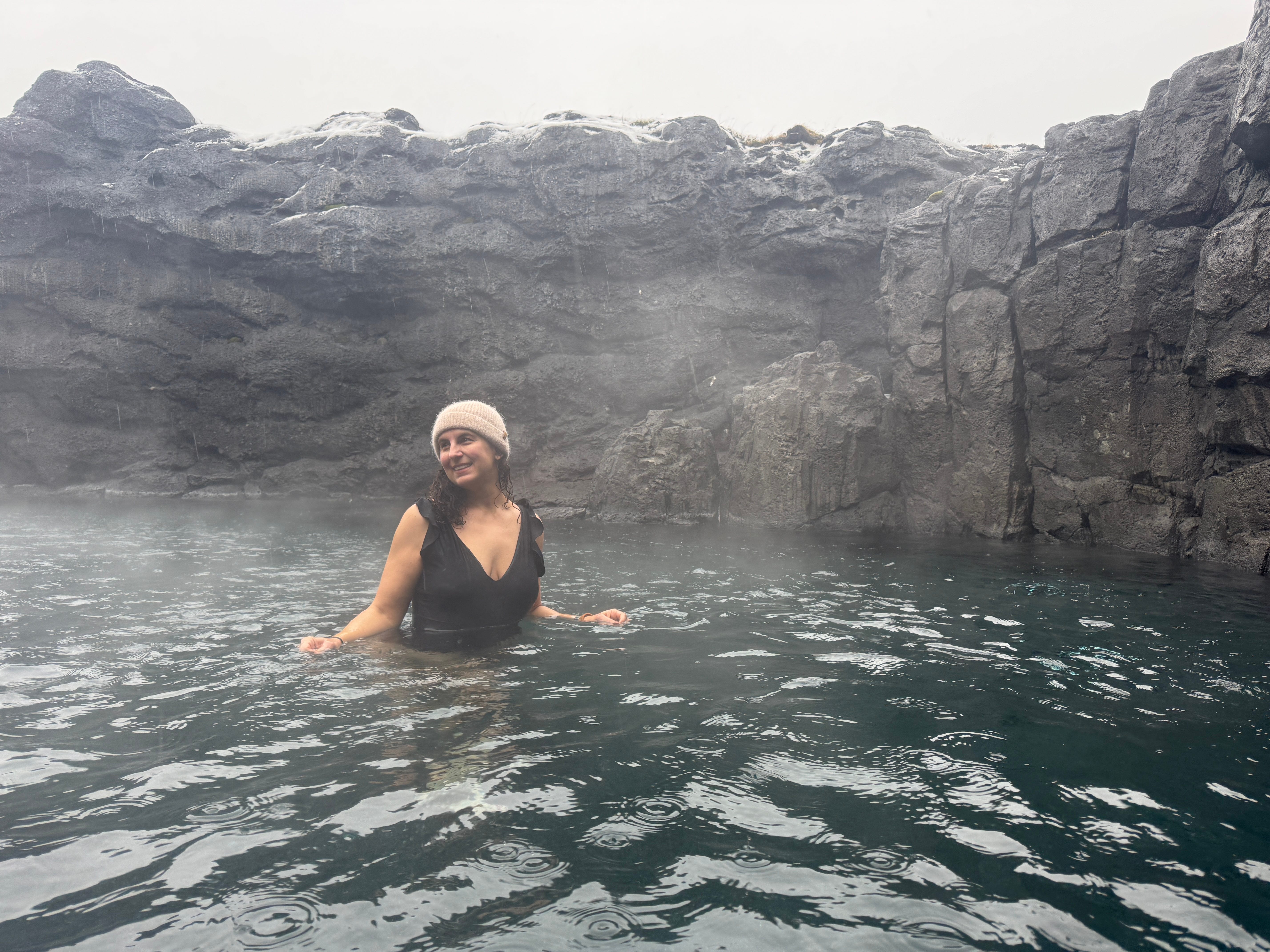 Author Jamie Davis Smith in hot spring in Iceland