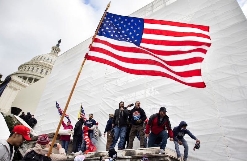 Trump supporters clash with police and security forces as people try to storm the U.S. Capitol in Washington D.C. on January 6, 2021.