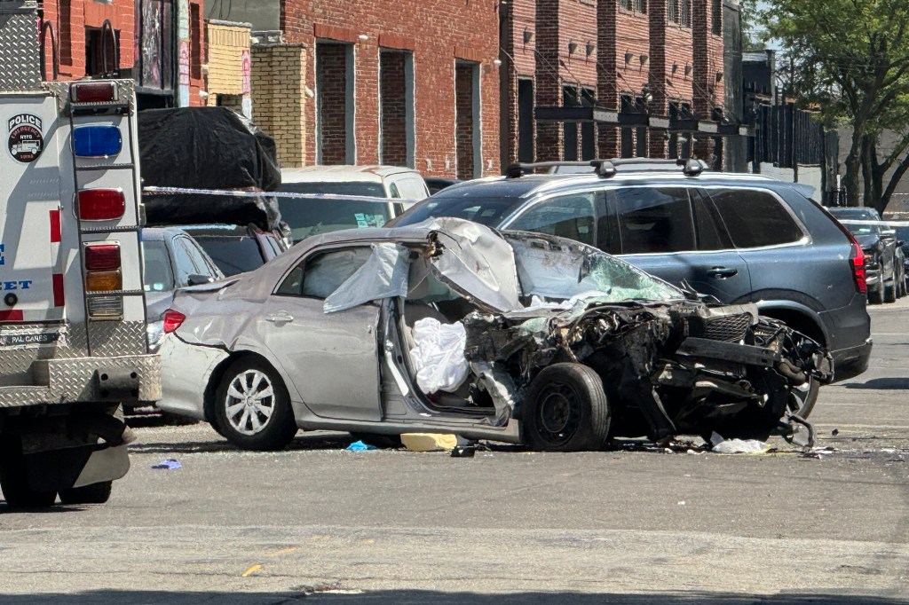 A Toyota Corolla involved in a fatal crash in Astoria Queens Tuesday, Aug. 12, 2025. An 84-year-old driver struck and killed two pedestrians ordering at a food truck near 19 Avenue and 42 Street.