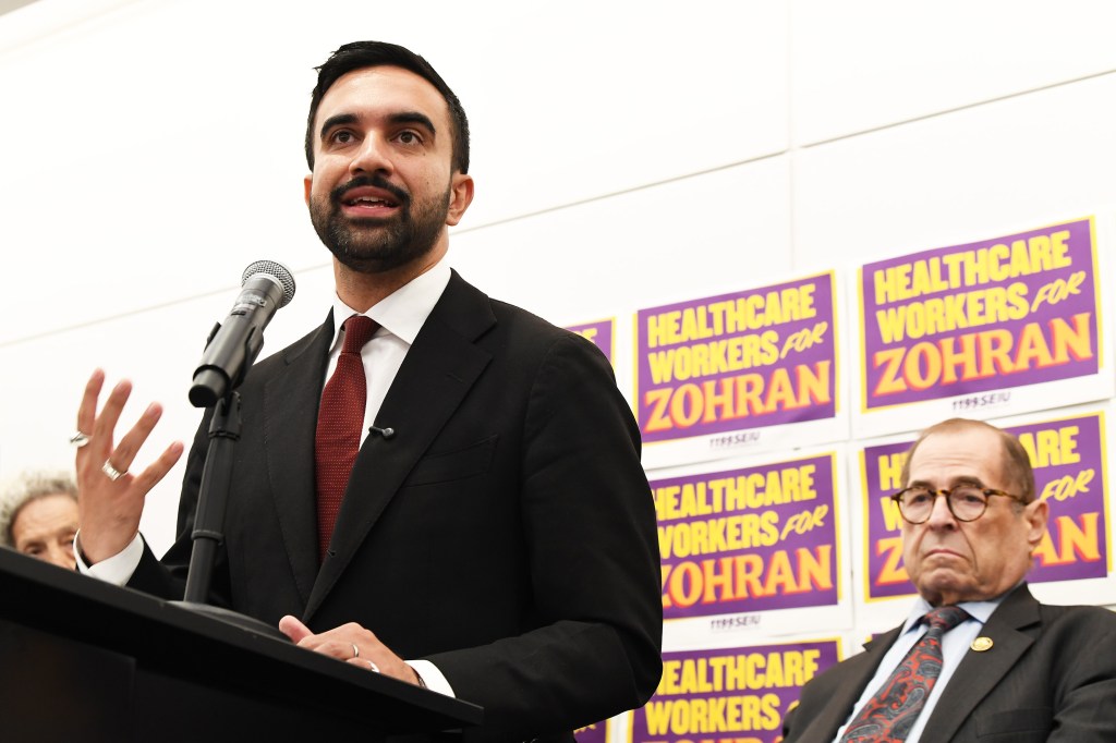 Zohran Mamdani speaking at a press conference.