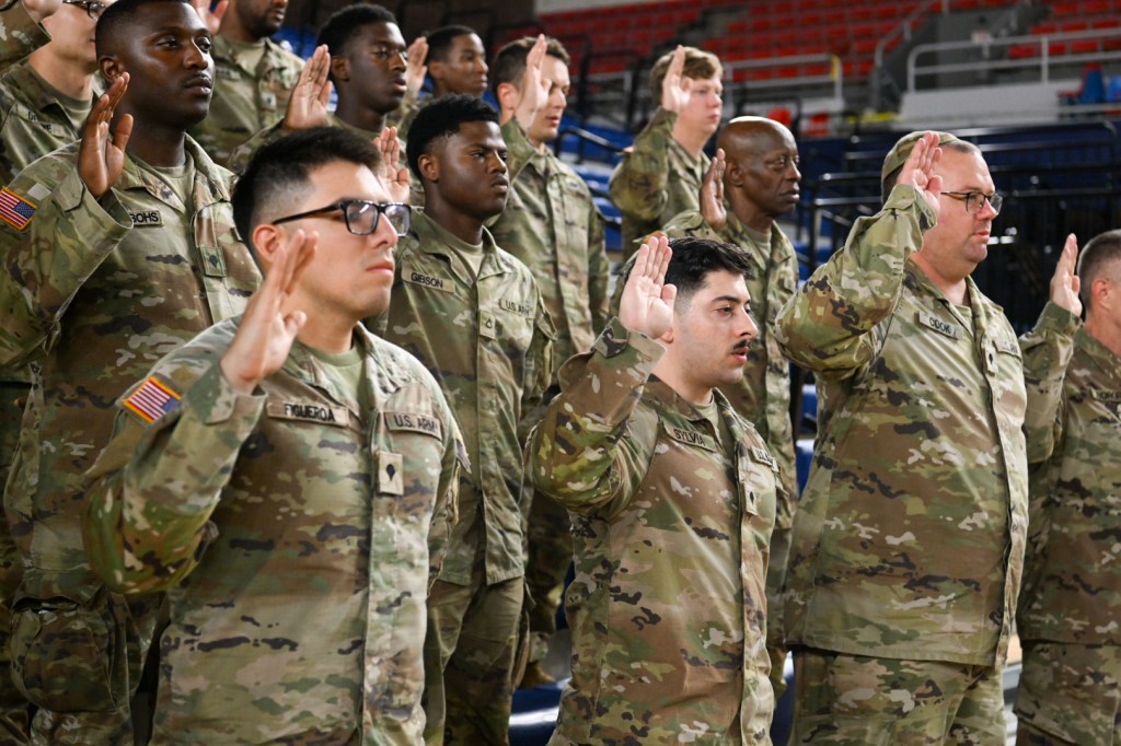 Members of the National Guard deployed to Washington DC take an oath after arriving in the nation's capitol on Aug. 12, 2025.