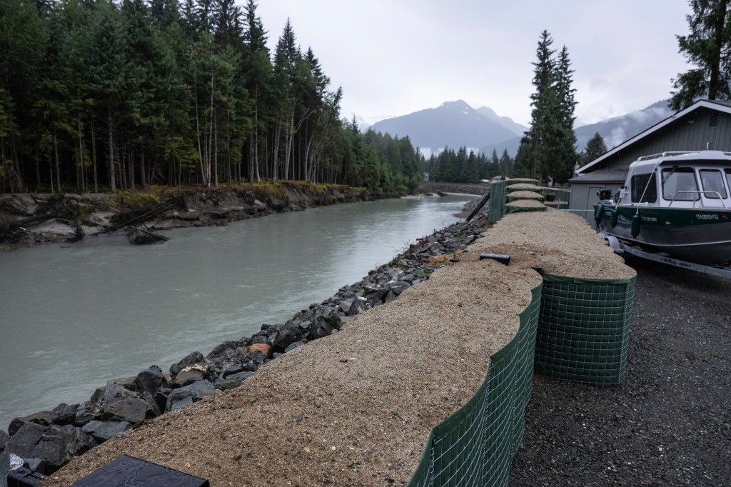 HESCO flood barriers protect a residential area from the Mendenhall River in Juneau, Alaska on Aug. 3, 2025.