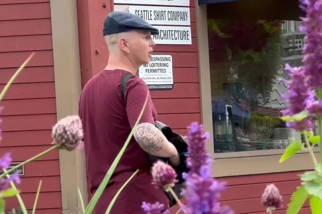 Suspected gunman, Gregory Timm, is seen having a confrontation with the 68-year-old about his military service moments before the shooting.