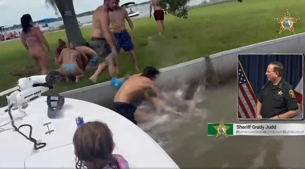 Video footage of a fight at a waterfront location, with an inset of Sheriff Grady Judd commenting.