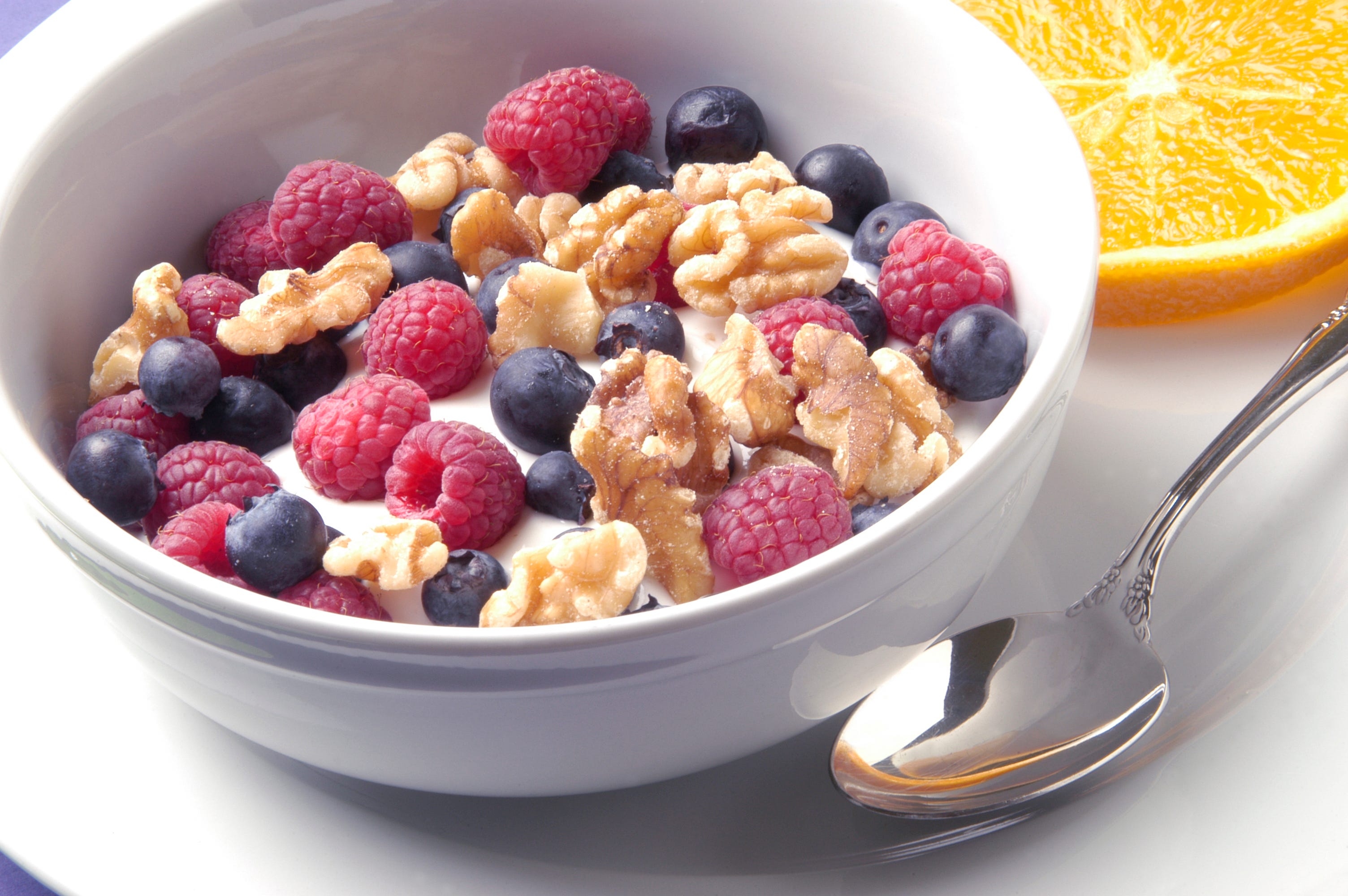 Yogurt with berries and nuts.