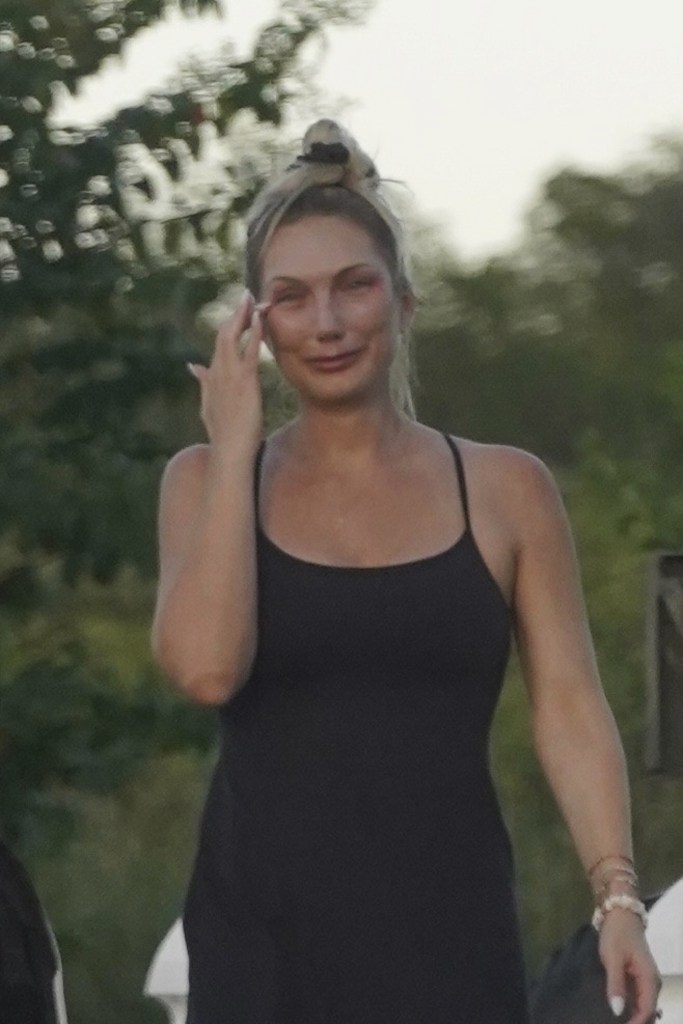 Hulk Hogan's daughter Brooke is pictured crying while walking with her family.