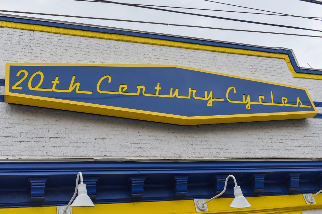 20th Century Cycles sign on a brick building.