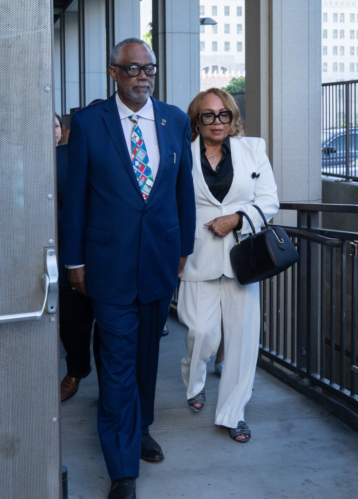 Curren Price and his wife Del Richardson leaving court.