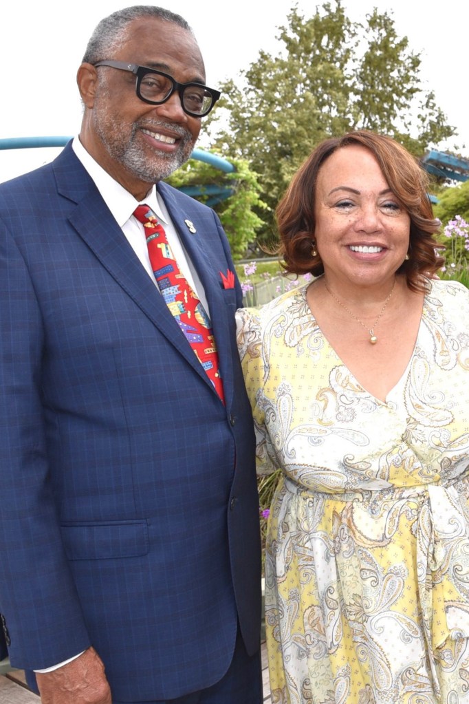 Curren Price and Del Richardson pose for a photo.