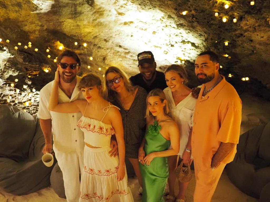 Travis Kelce poses with Taylor Swift and friends.