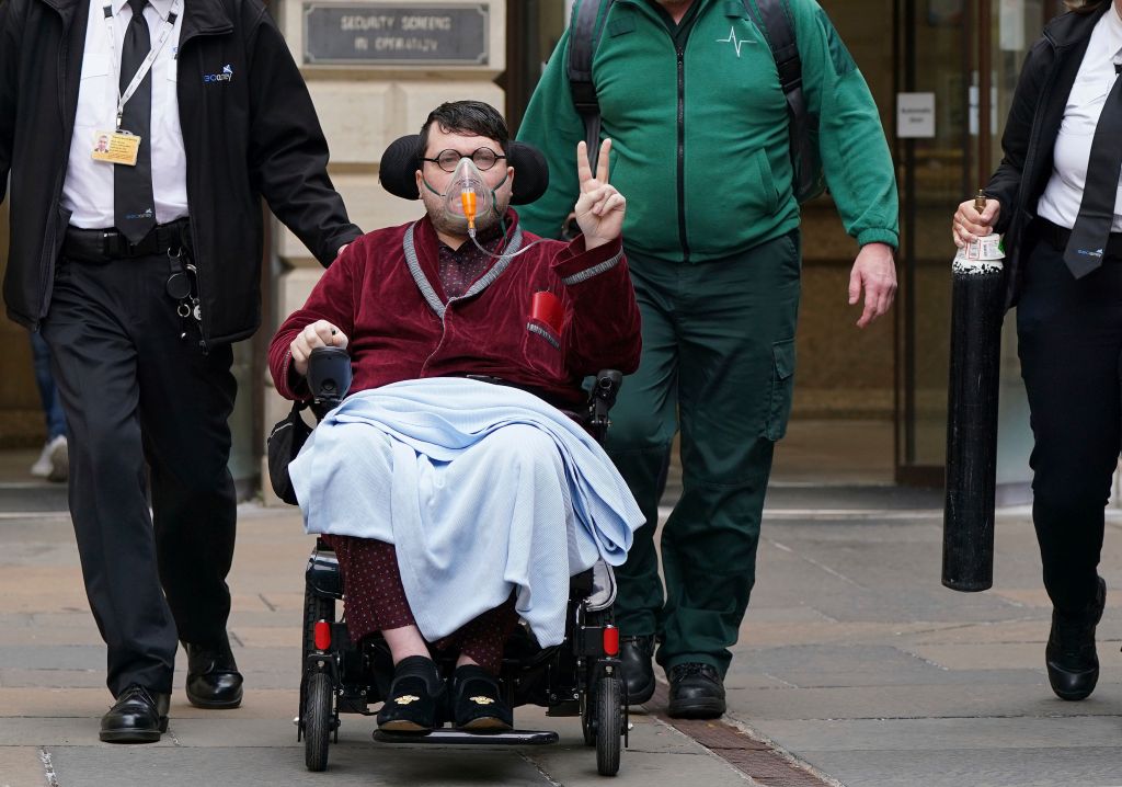 Rossi leaves Edinburgh Sheriff And Justice Of The Peace Court after an extradition hearing, in Edinburgh, July 12, 2022.