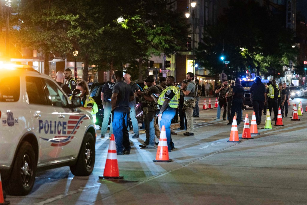 Federal agents and DC Metro Police conduct a traffic checkpoint on Aug. 13, 2025.